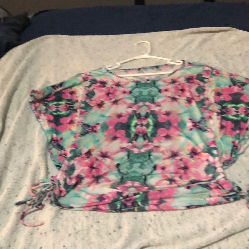 Women’s blouse floral. Ties on side